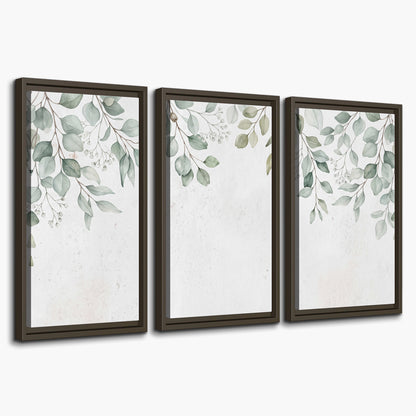 Pale sage eucalyptus leaves against a light background 3 piece framed canvas wall art on a white background