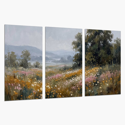 A flower-filled meadow overlooking soft blue mountain ridges set of 3 poster prints on a white background