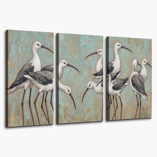 Long-legged white and gray wading birds against a muted aqua background 3 piece canvas wall art on a white background