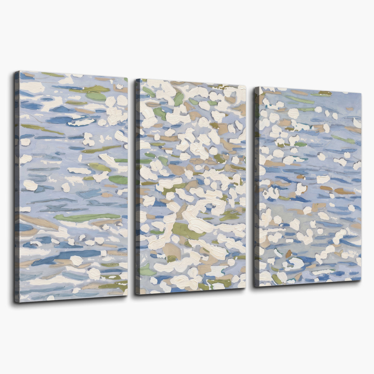 Loose pale blue, white and soft green marks suggesting shimmering water 3 piece canvas wall art on a white background