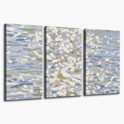 Loose pale blue, white and soft green marks suggesting shimmering water 3 piece canvas wall art on a white background