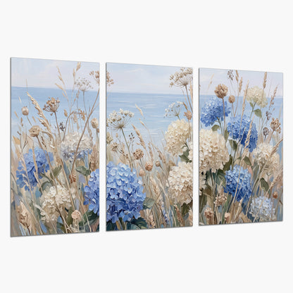 Blue hydrangeas and delicate ivory wildflowers beneath a pale blue sky set of 3 poster prints on a white background