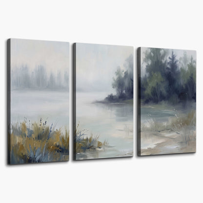 A calm pale lake bordered by dark evergreen trees and distant mist 3 piece canvas wall art on a white background