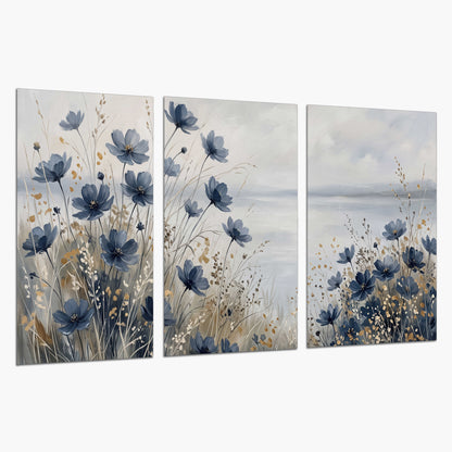 Soft blue flowers and ivory grasses beside a pale coastal horizon set of 3 poster prints on a white background