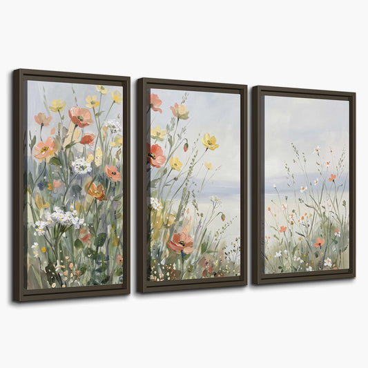 Small colorful wildflowers and light grasses beside a pale lake 3 piece framed canvas wall art on a white background