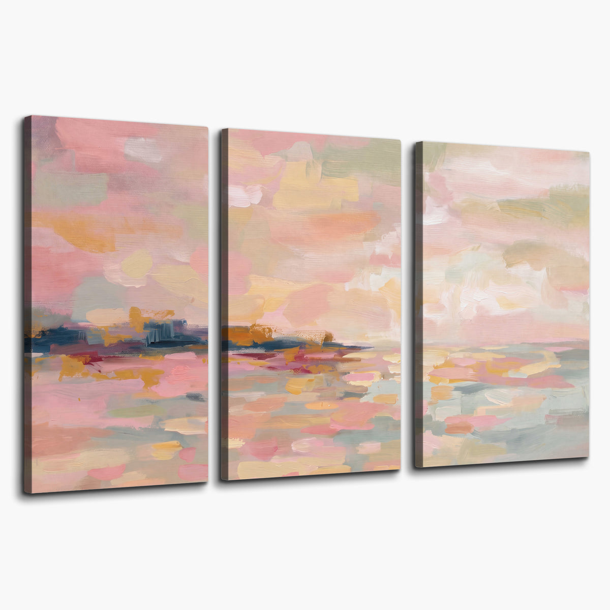 Pink, peach and yellow painted-style sky and water reflections 3 piece canvas wall art on a white background