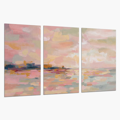 Pink, peach and yellow painted-style sky and water reflections set of 3 poster prints on a white background