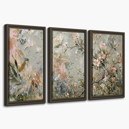 Delicate pink and ivory flowering branches against muted sage green 3 piece framed canvas wall art on a white background