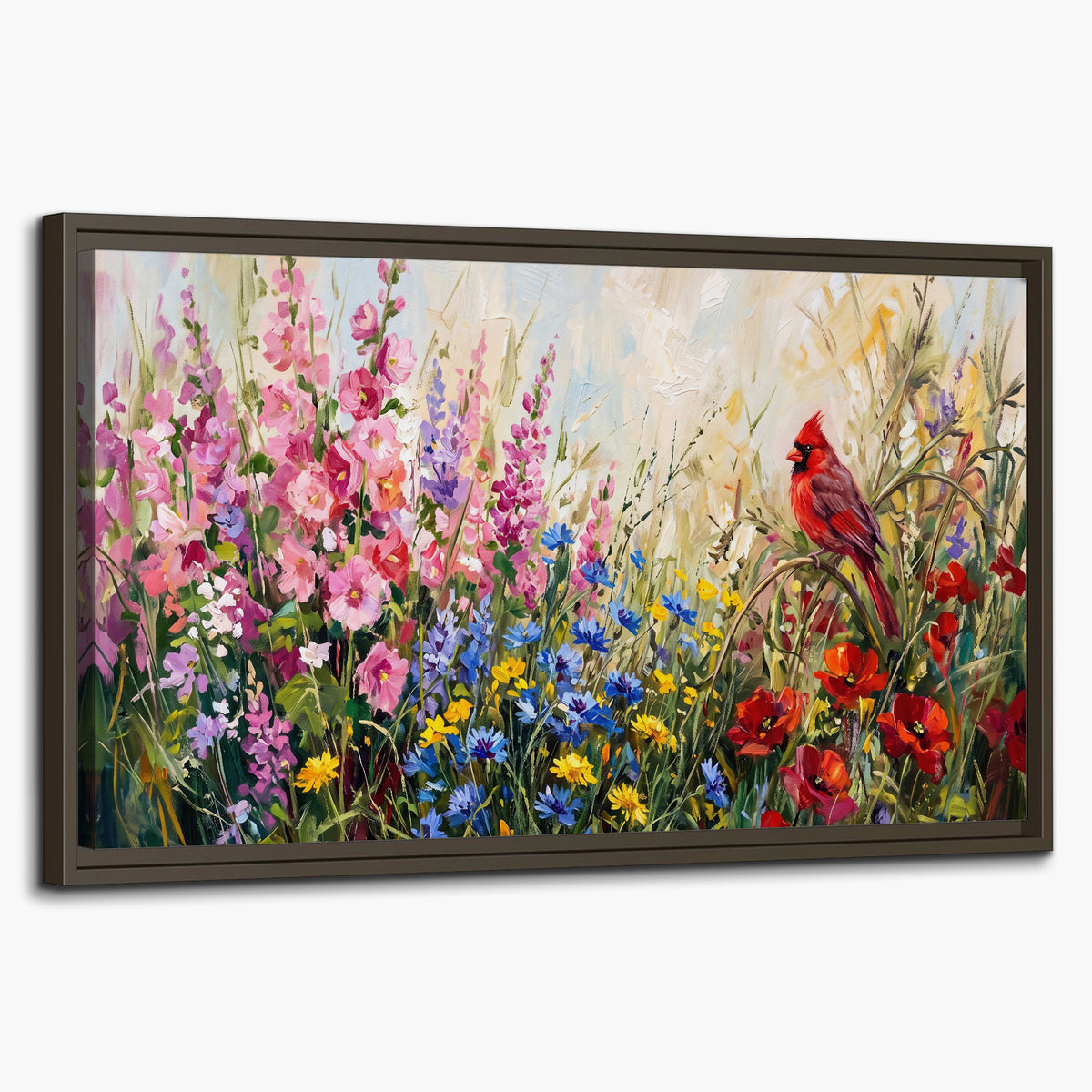 A bright red cardinal among vivid pink, blue and yellow wildflowers single framed canvas wall art on a white background