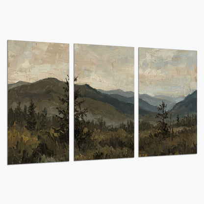 Layered mountain ridges and dark evergreen trees beneath a muted cloudy sky set of 3 poster prints on a white background