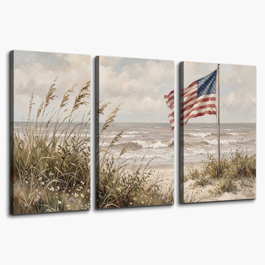 An American flag above coastal grasses beside a quiet sandy beach 3 piece canvas wall art on a white background