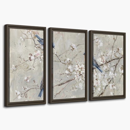 Bluebirds perched on delicate white flowering branches against pale sage 3 piece framed canvas wall art on a white background