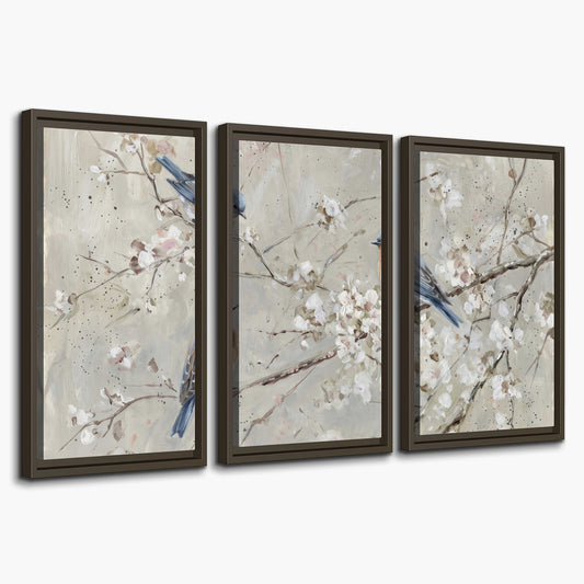 Bluebirds perched on delicate white flowering branches against pale sage 3 piece framed canvas wall art on a white background