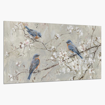 Bluebirds perched on delicate white flowering branches against pale sage single poster print on a white background