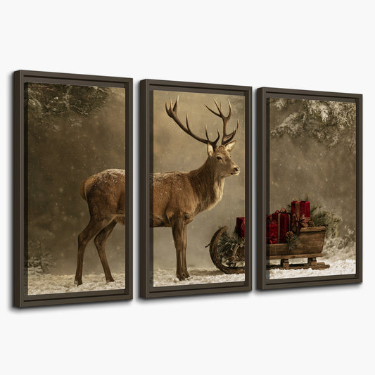 A stately reindeer standing beside a sleigh of red presents in a snowy forest 3 piece framed canvas wall art on a white background