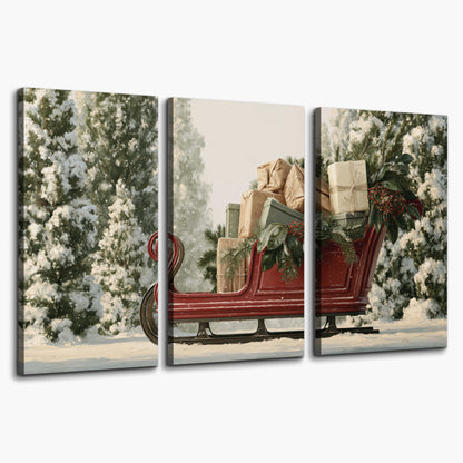 A red sleigh filled with wrapped gifts and evergreen branches among snowy fir trees 3 piece canvas wall art on a white background