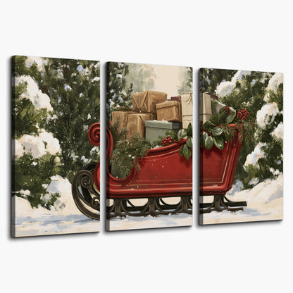 A decorative red holiday sleigh carrying wrapped presents and greenery through a snowy woodland 3 piece canvas wall art on a white background