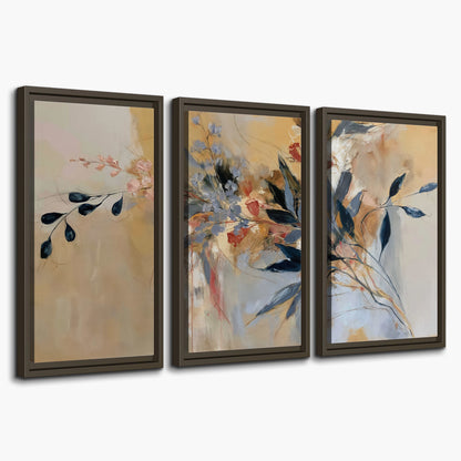 Loose dark blue leaves and pale blossoms on a warm beige painterly background 3 piece framed canvas wall art on a white background
