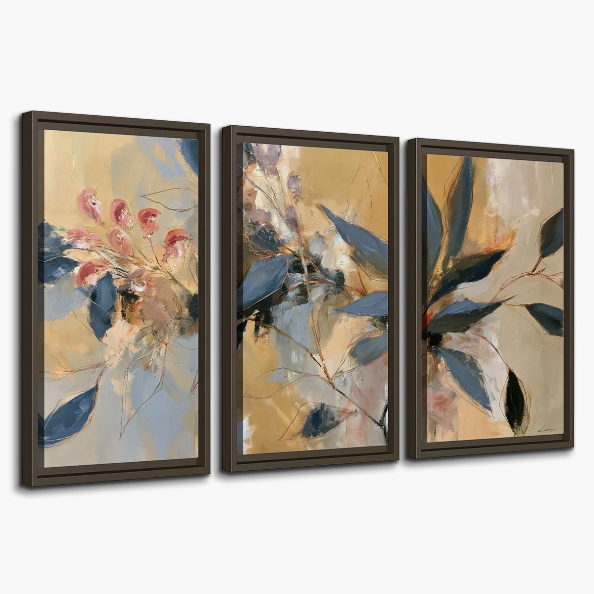 Layered navy leaves and muted pink blossoms against a golden cream background 3 piece framed canvas wall art on a white background