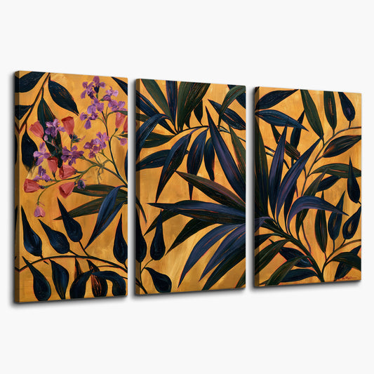 Dark pointed bamboo leaves across an ochre background with small pink floral accents 3 piece canvas wall art on a white background
