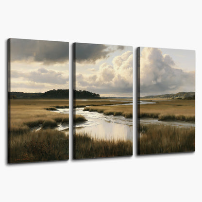 Pools of still water reflecting a dramatic cloud-filled sky across a golden marsh 3 piece canvas wall art on a white background