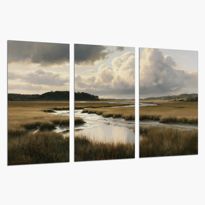 Pools of still water reflecting a dramatic cloud-filled sky across a golden marsh set of 3 poster prints on a white background