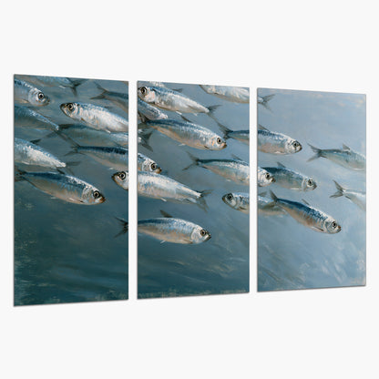 A school of silver fish moving together through cool blue water set of 3 poster prints on a white background