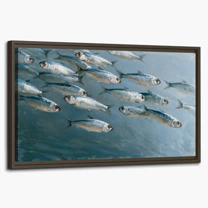 A school of silver fish moving together through cool blue water single framed canvas wall art on a white background