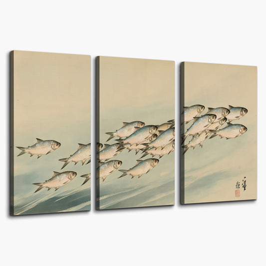 A flowing school of small fish above pale blue water on a cream ground 3 piece canvas wall art on a white background