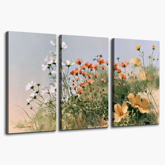 White and orange meadow flowers with fine green stems under a pale sky 3 piece canvas wall art on a white background