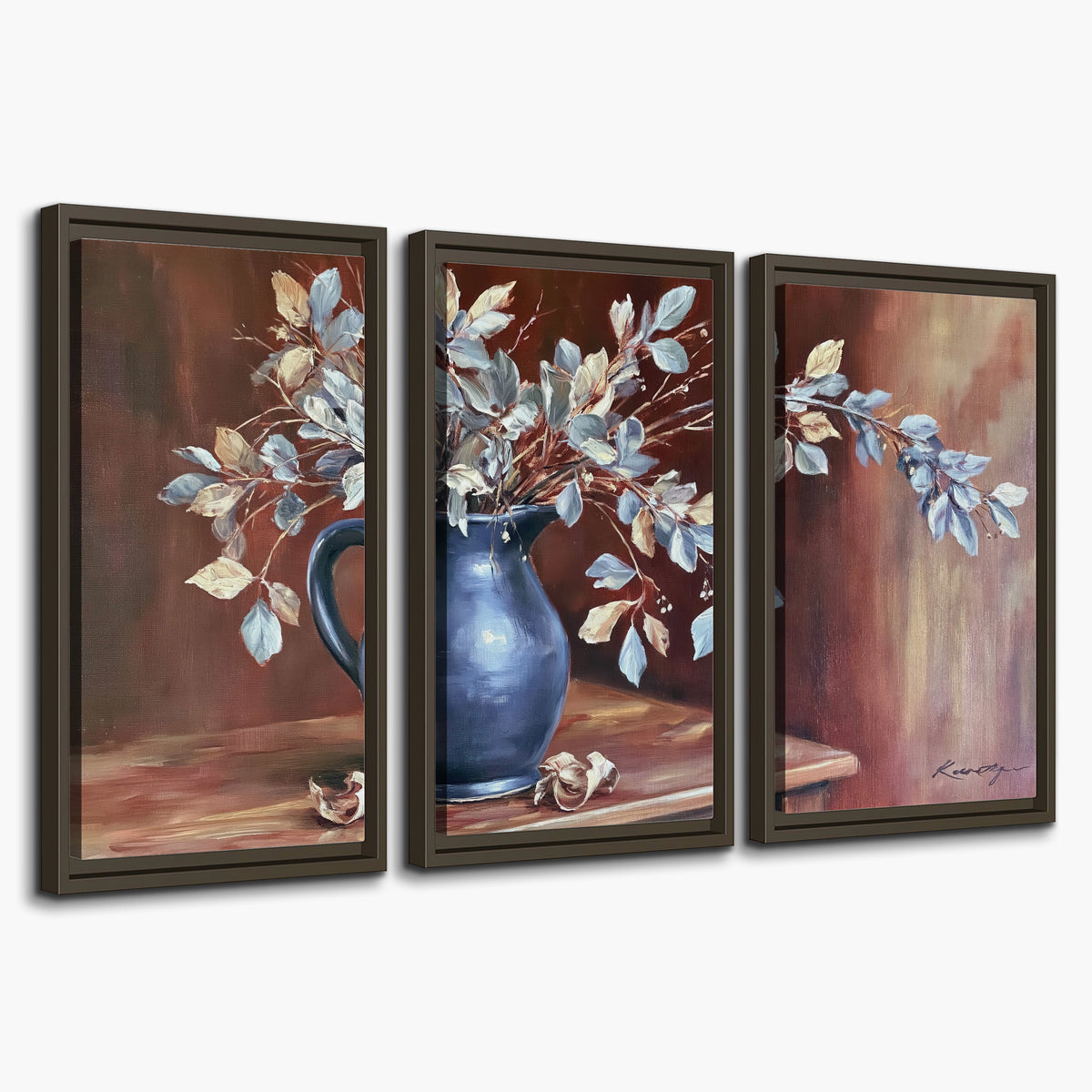 White flowering branches gathered in a deep blue pitcher against a warm rust-colored wall 3 piece framed canvas wall art on a white background