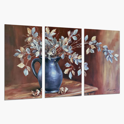 White flowering branches gathered in a deep blue pitcher against a warm rust-colored wall set of 3 poster prints on a white background