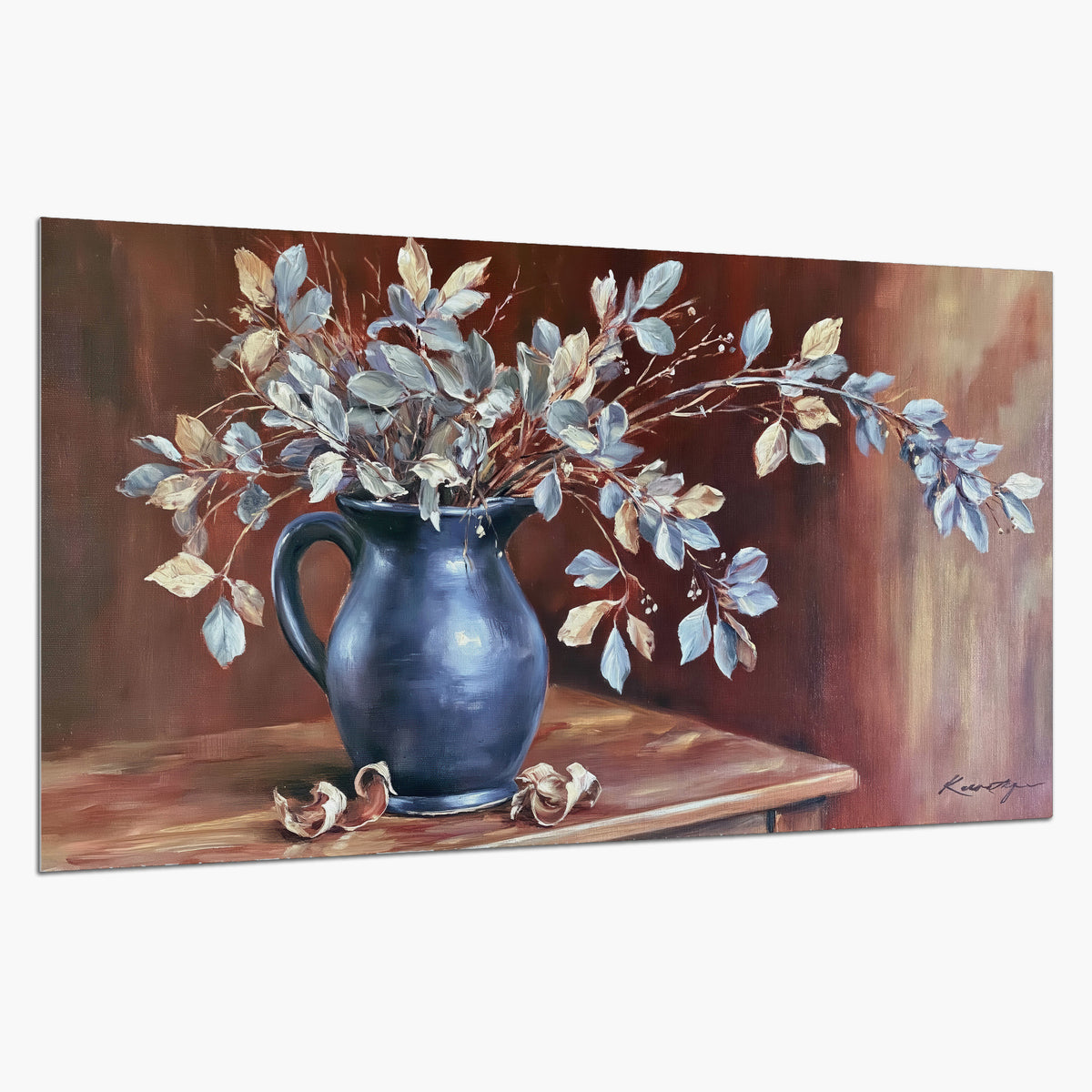 White flowering branches gathered in a deep blue pitcher against a warm rust-colored wall single poster print on a white background