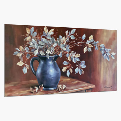 White flowering branches gathered in a deep blue pitcher against a warm rust-colored wall single poster print on a white background