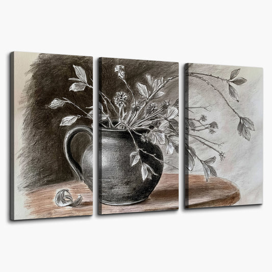 Fine leafy branches spilling from a dark rounded vase in a soft monochrome still life 3 piece canvas wall art on a white background