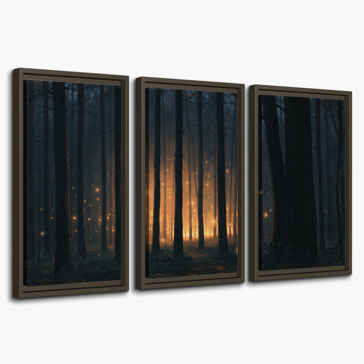 A warm amber glow shining between closely spaced dark forest trunks 3 piece framed canvas wall art on a white background