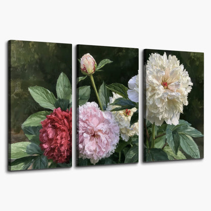 Cream, blush and red peonies surrounded by fresh green leaves 3 piece canvas wall art on a white background