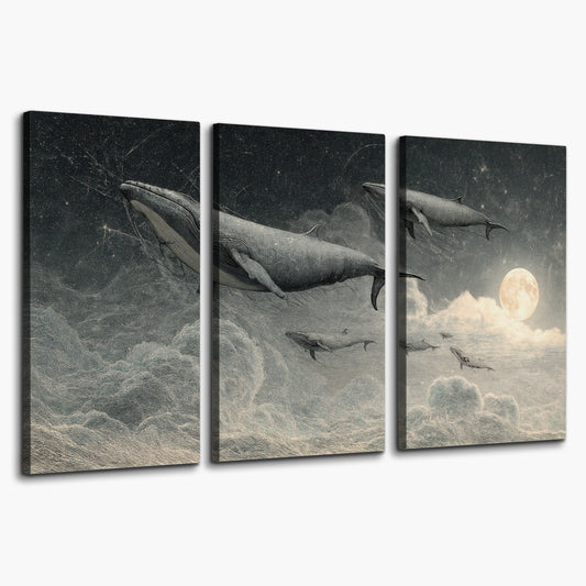 Monochrome whales floating over misty clouds beside a luminous painted moon 3 piece canvas wall art on a white background