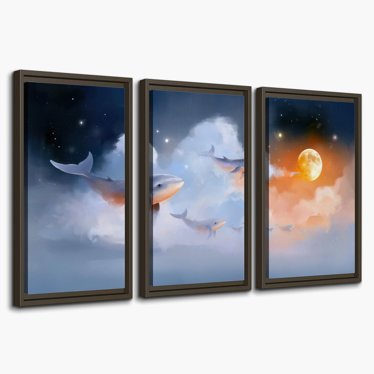 Blue whales gliding through pastel clouds beneath stars and a warm orange moon 3 piece framed canvas wall art on a white background