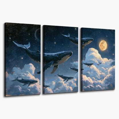 A group of whales floating among clouds beneath a golden moon in a deep blue night sky 3 piece canvas wall art on a white background