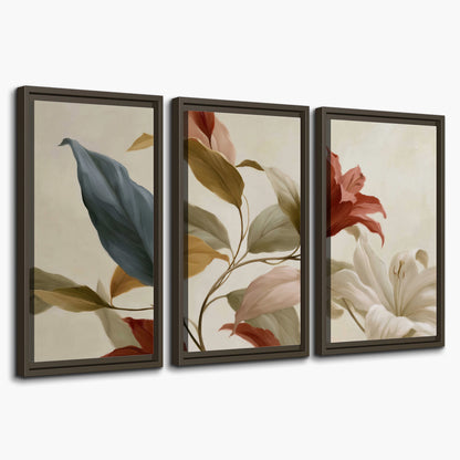 Cream flowers with broad blue and rust leaves sweeping across a neutral background 3 piece framed canvas wall art on a white background