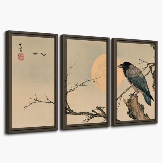 A dark raven perched on a bare branch beside a warm full moon 3 piece framed canvas wall art on a white background