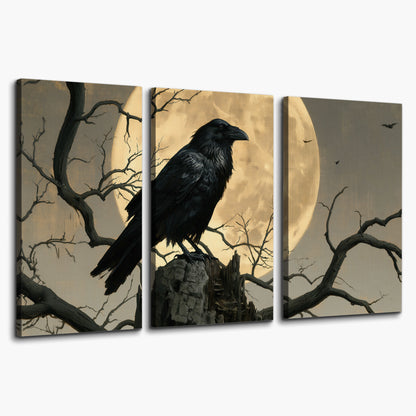 A black raven standing among bare branches in front of a large golden moon 3 piece canvas wall art on a white background