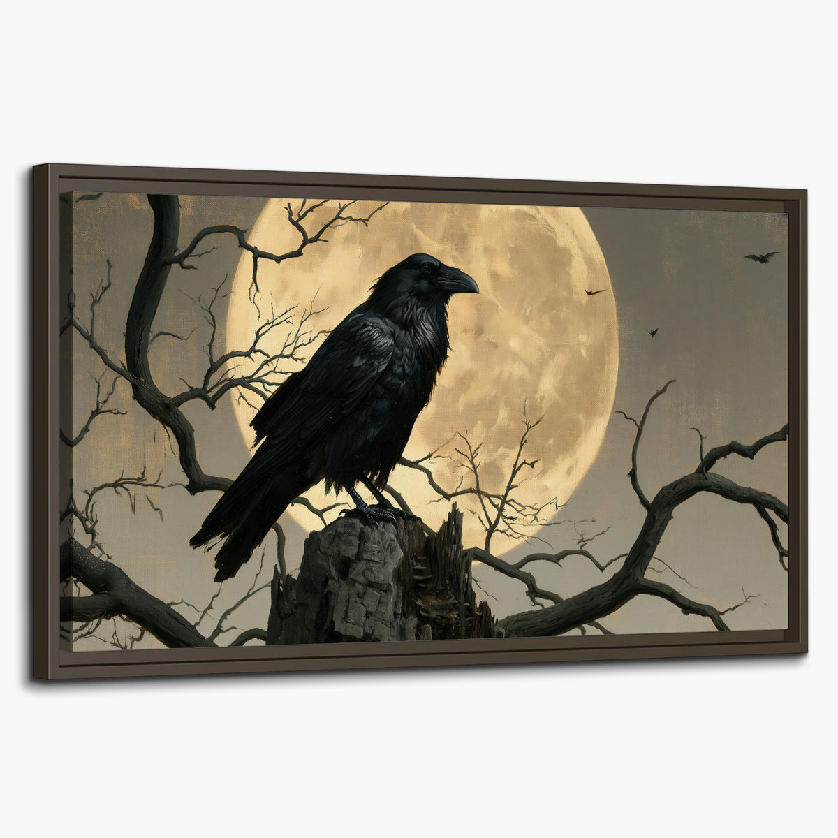A black raven standing among bare branches in front of a large golden moon single framed canvas wall art on a white background