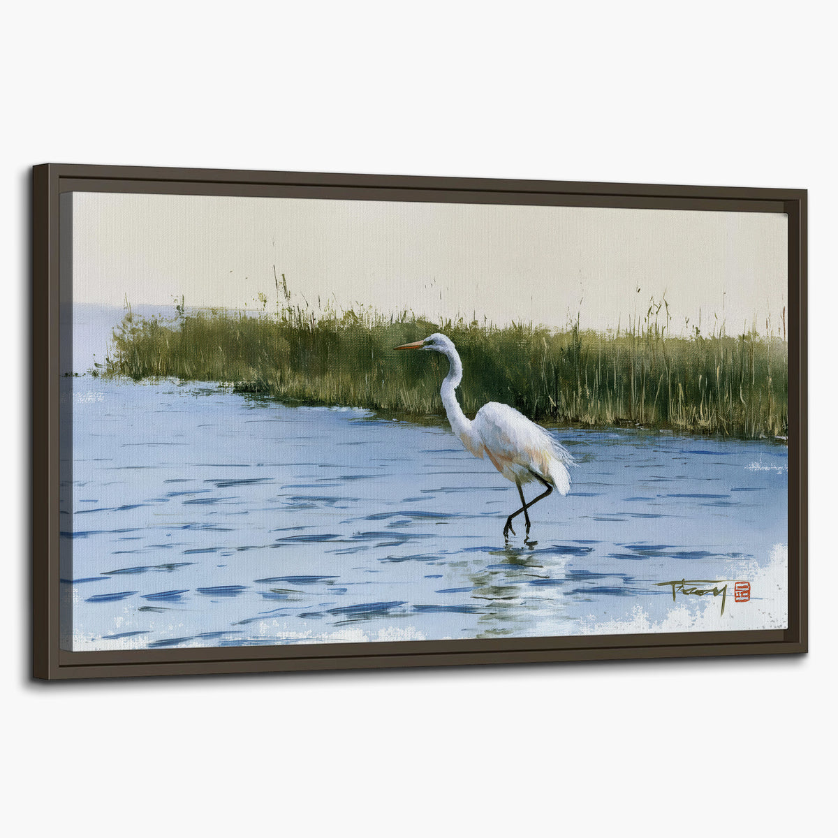 A white heron wading through bright blue water beside green reeds single framed canvas wall art on a white background