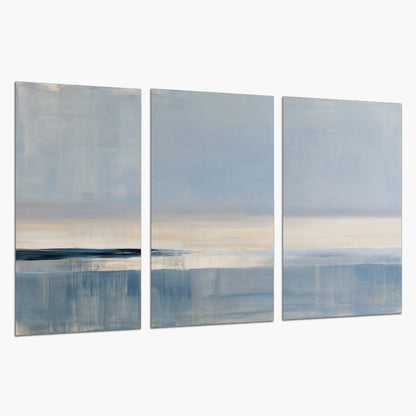 A minimal blue seascape with a pale horizon and soft vertical reflections set of 3 poster prints on a white background