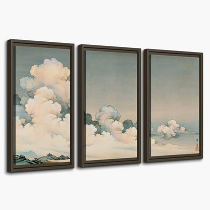 Soft cream clouds gathered low in a muted blue-green sky 3 piece framed canvas wall art on a white background