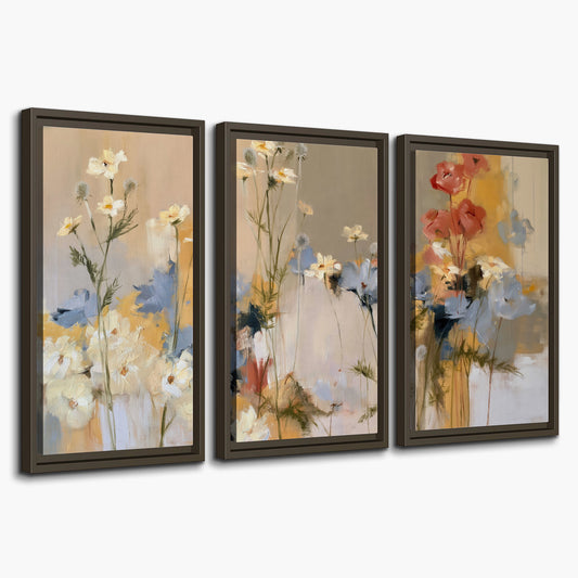 Loose white and yellow flowers set against vertical blue and golden strokes 3 piece framed canvas wall art on a white background