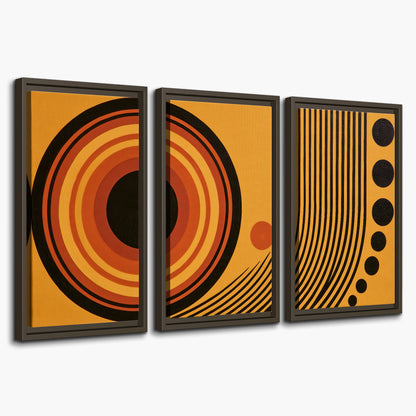 Bold black, orange and golden circles with parallel curved lines and small dots 3 piece framed canvas wall art on a white background