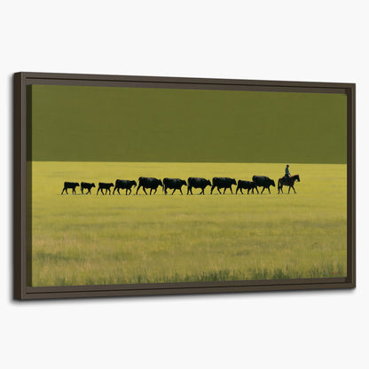 A rider leading a long line of cattle across a wide green and golden plain single framed canvas wall art on a white background